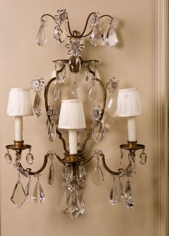 Pair of French, Late 19th Century, Crystal and Bronze Sconces Attributed to Bagues - Click to enlarge and for full details.